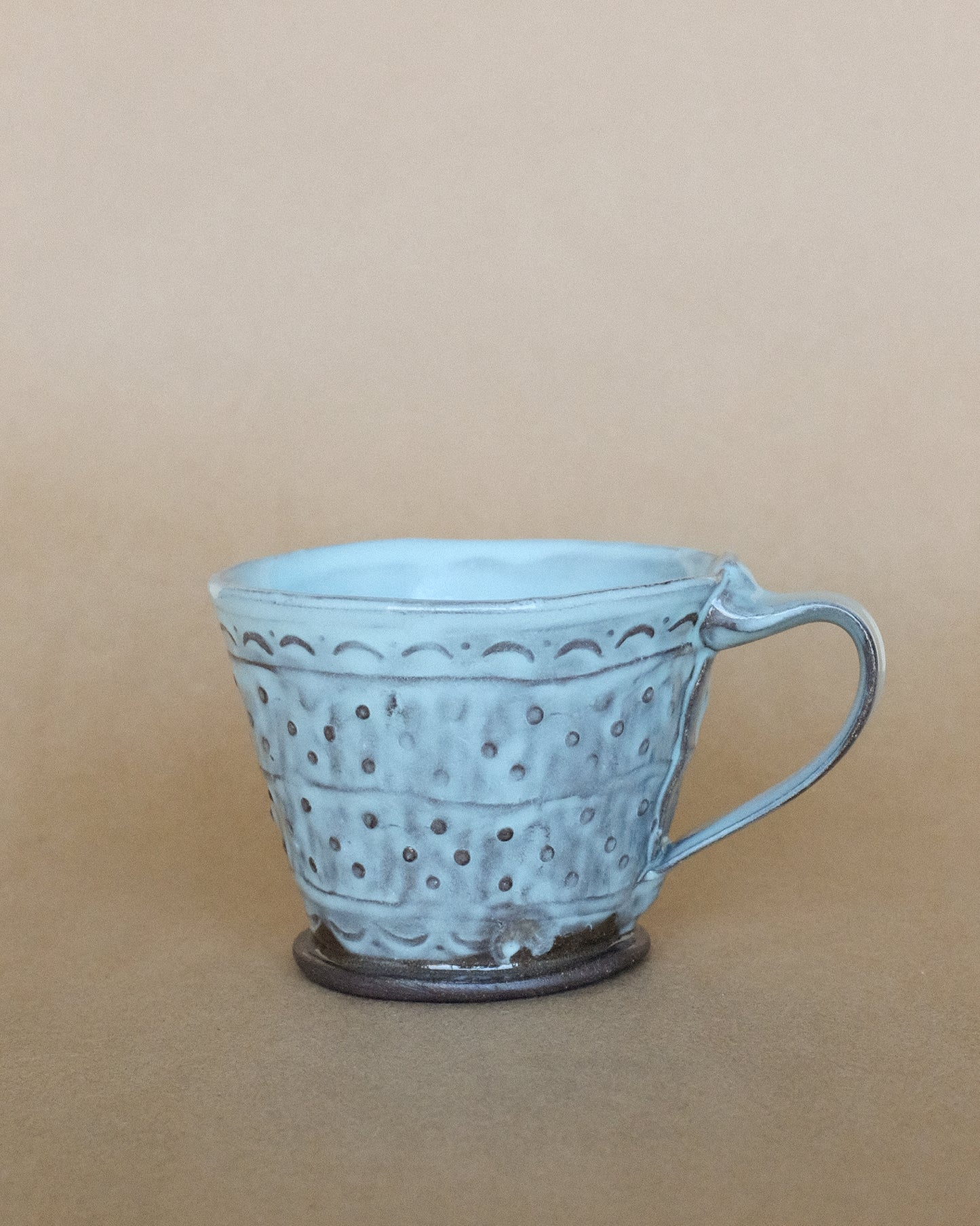 La tasse à café à motifs 01
